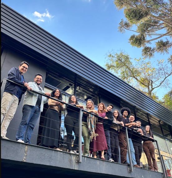 Quera Studio team gathered together outside the studio